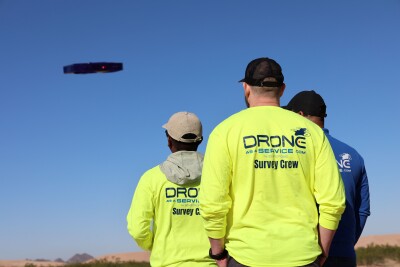 Members of ZenaTech's Drone as a Service team in the field